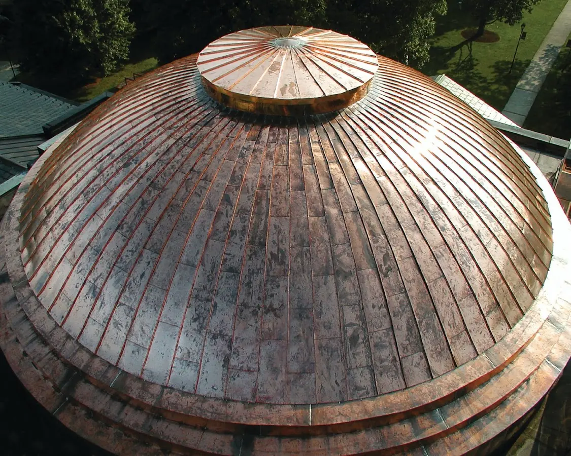 Craftsman Roofing crew installing a new roof in Oak Bluffs